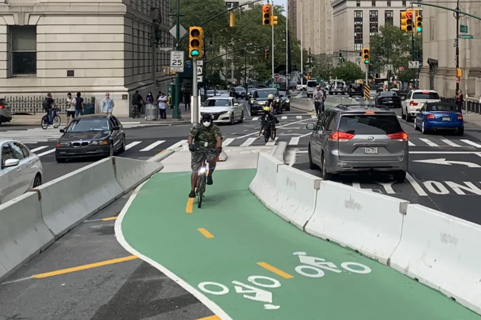 Green painted and protected bike lane on Centre Street